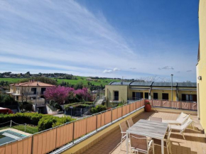 Appartamento L'Azalea - a due passi da Numana con grande terrazzo e piscina condominiale stagionale